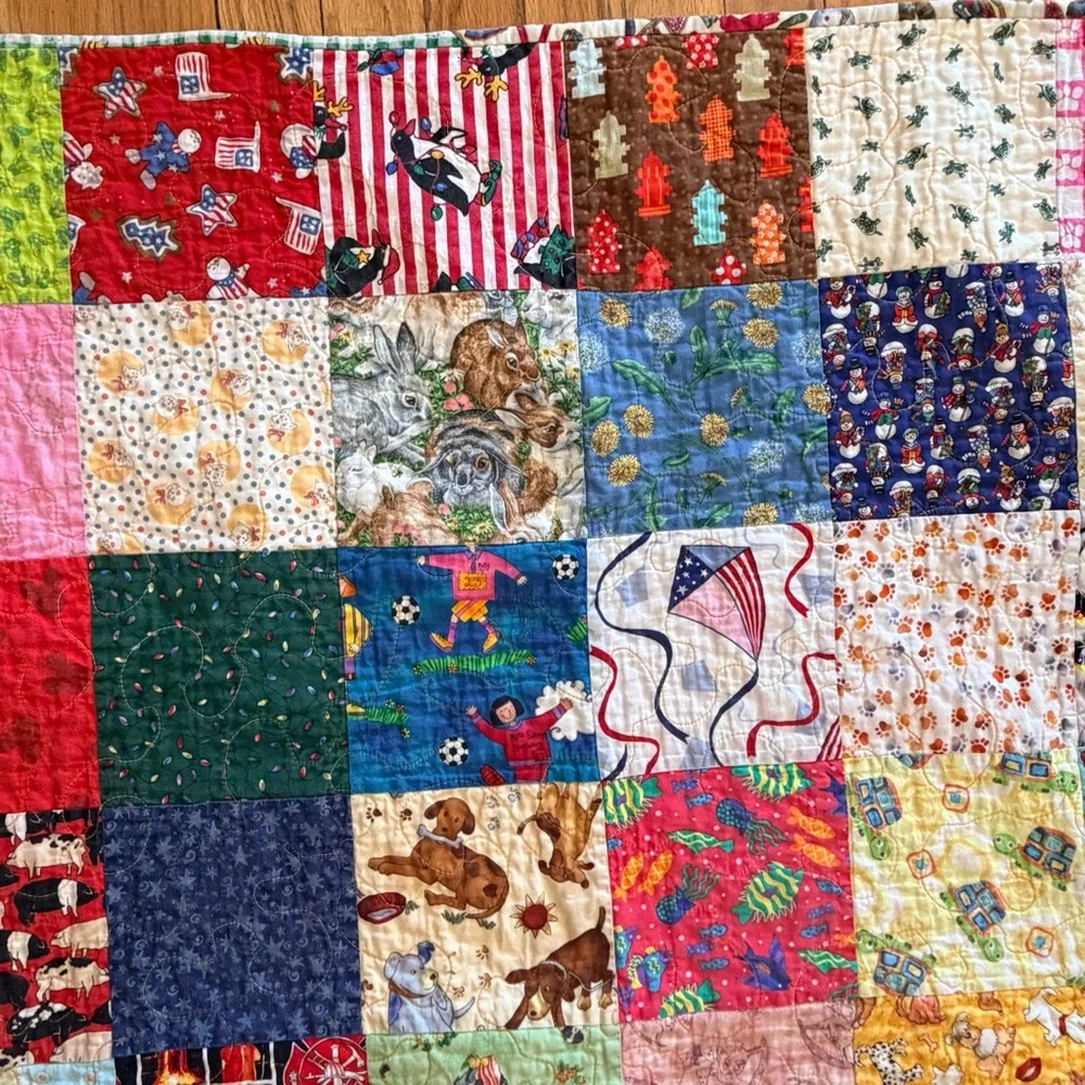 Small hand crafted patchwork child theme quilt